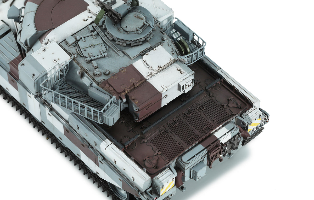 A close-up studio shot of a detailed model tank or armored vehicle, shown from an elevated rear-three-quarter angle on a plain white background.